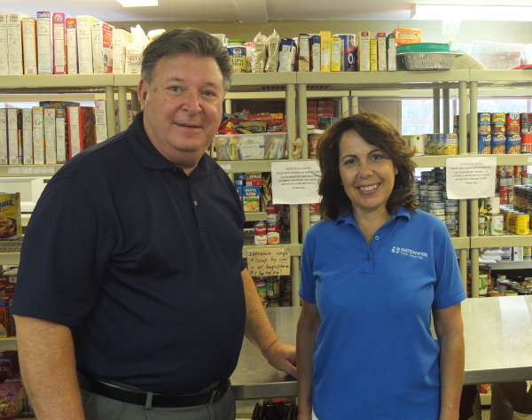 F.E.A.S.T Director, Walter Anderson, with Nationwide Title Clearing Community Relations Director, Janice Rush